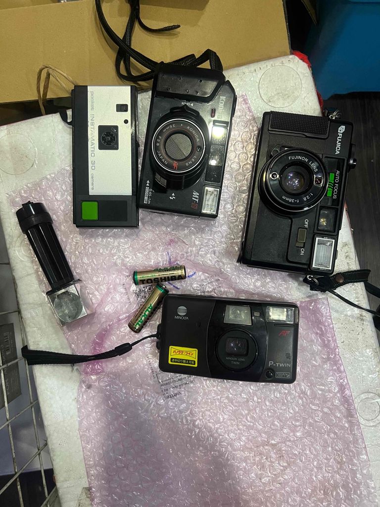 Máy ảnh Konica MT-100 Đen hoạt động tốt. Mua bán Máy ảnh, Máy quay tại Thành phố Thuận An Bình Dương được đăng bởi Đạt Chuối hình 1