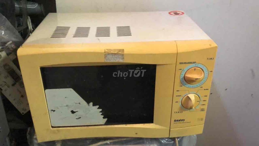 Lò vi sóng Sanyo EM-G2063 Vàng kem. Mua bán Bếp, lò, đồ điện nhà bếp tại Quận Tân Bình Tp Hồ Chí Minh được đăng bởi Trịnh Bằng hình 1