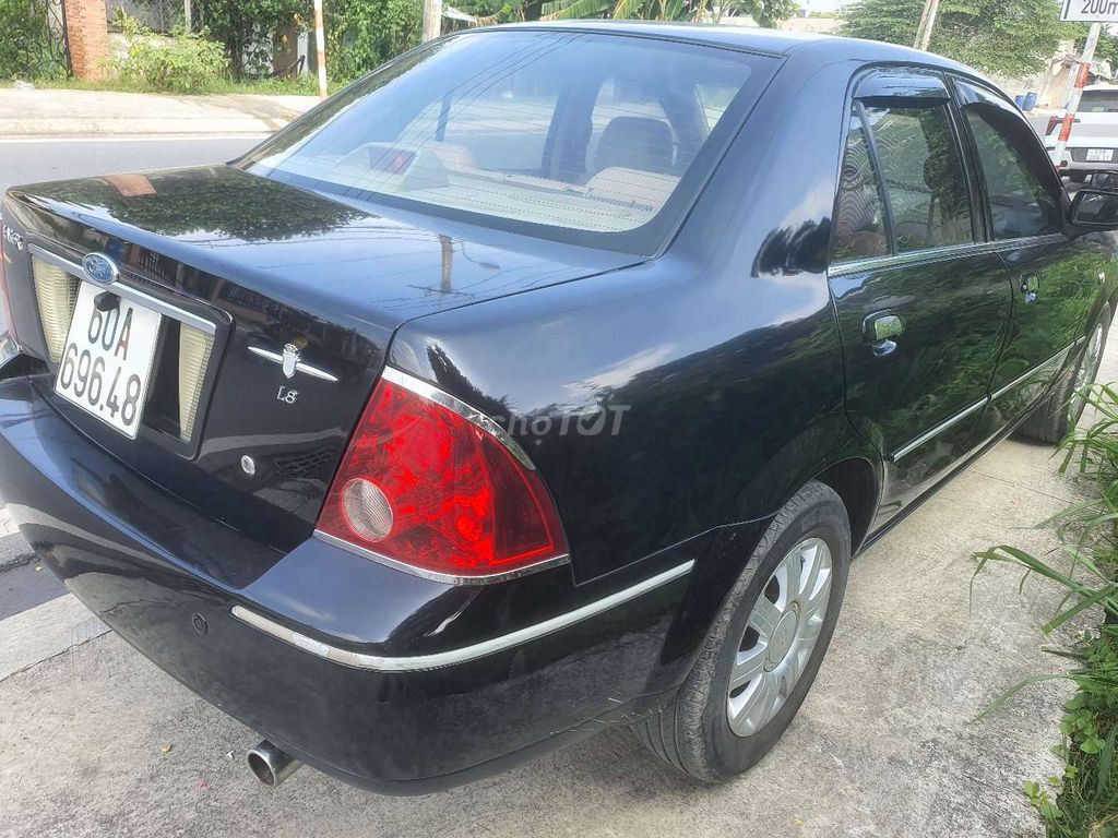 Ford Laser 2004 Đen. Mua bán Ô tô tại Huyện Củ Chi Tp Hồ Chí Minh được đăng bởi lê thanh hình 4