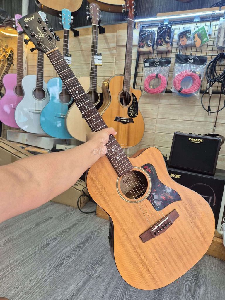 Đàn guitar Cort Acoustic Nâu. Mua bán Nhạc cụ tại Thành phố Nha Trang Khánh Hòa được đăng bởi Quang Le hình 1
