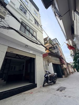 nhà Thạch Bàn  lô góc 30m x 5 tầng - ngõ thông gần  ô tô tránh.