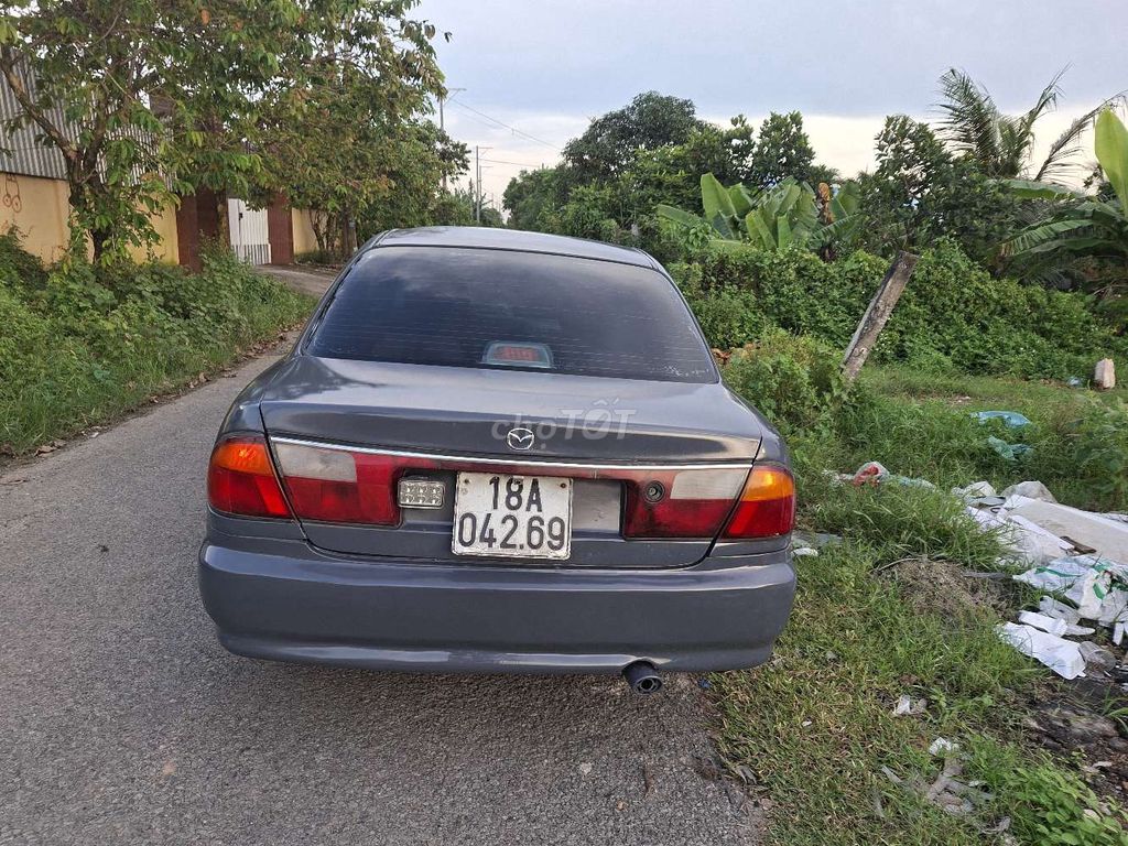Mazda 323 1999 Xám Số sàn. Mua bán Ô tô tại Huyện Hóc Môn Tp Hồ Chí Minh được đăng bởi Nguyễn văn thắng hình 2