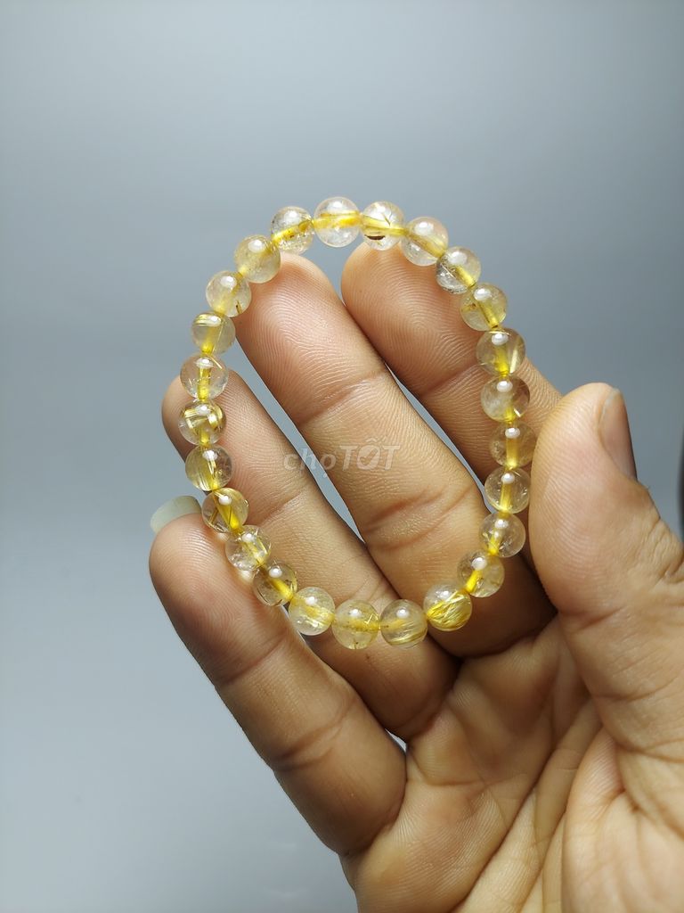 Vòng tay đá thạch anh tóc vàng 7.2 li. Mua bán Đồ sưu tầm, đồ cổ tại Huyện Vĩnh Cửu Đồng Nai được đăng bởi Thành Tâm hình 1