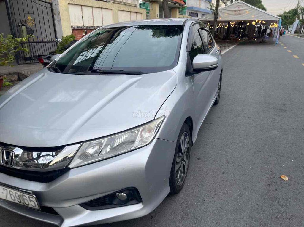 Bán xe Honda City 2016 số tự động, màu bạc, giá tố