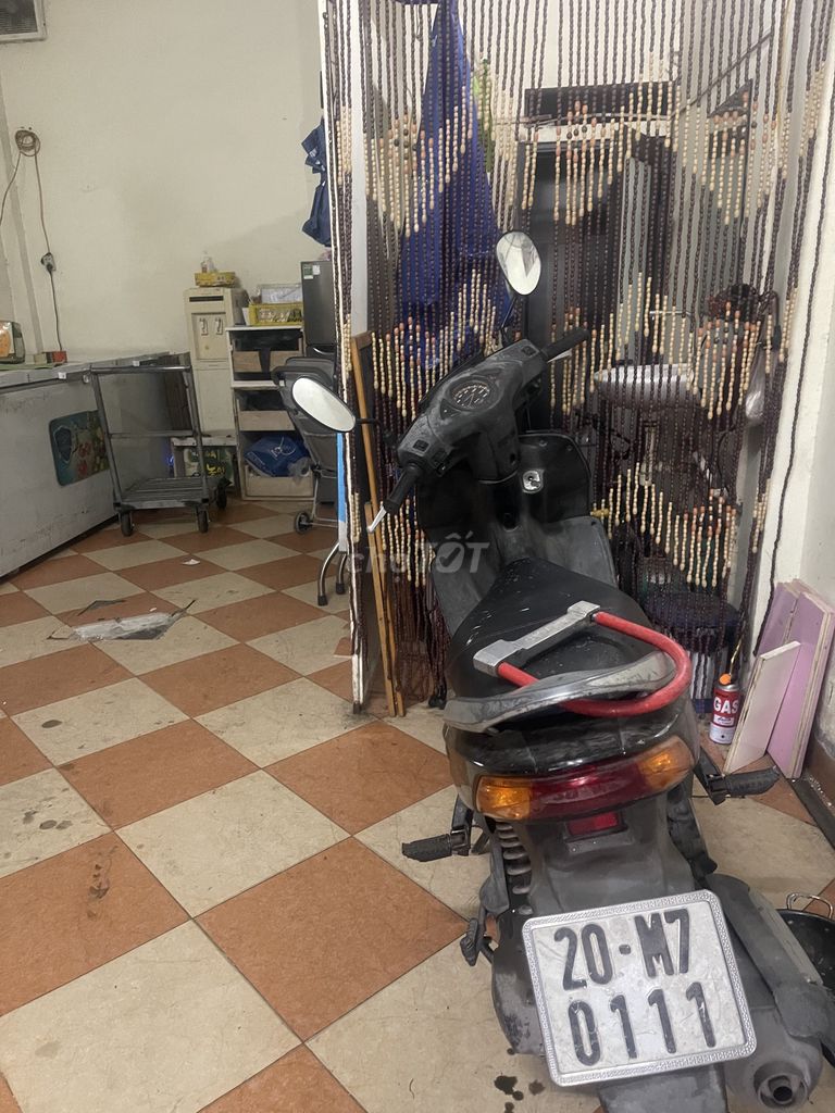 Черный скутер Honda Click