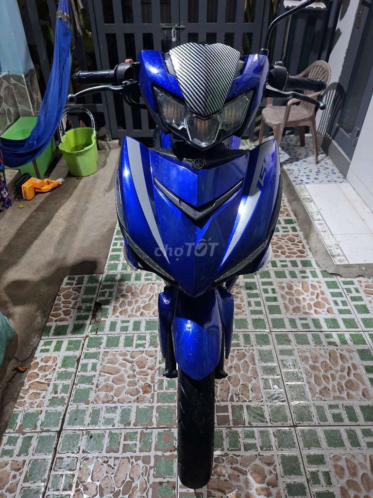 Зеленый спортивный мотоцикл Yamaha Exciter 150