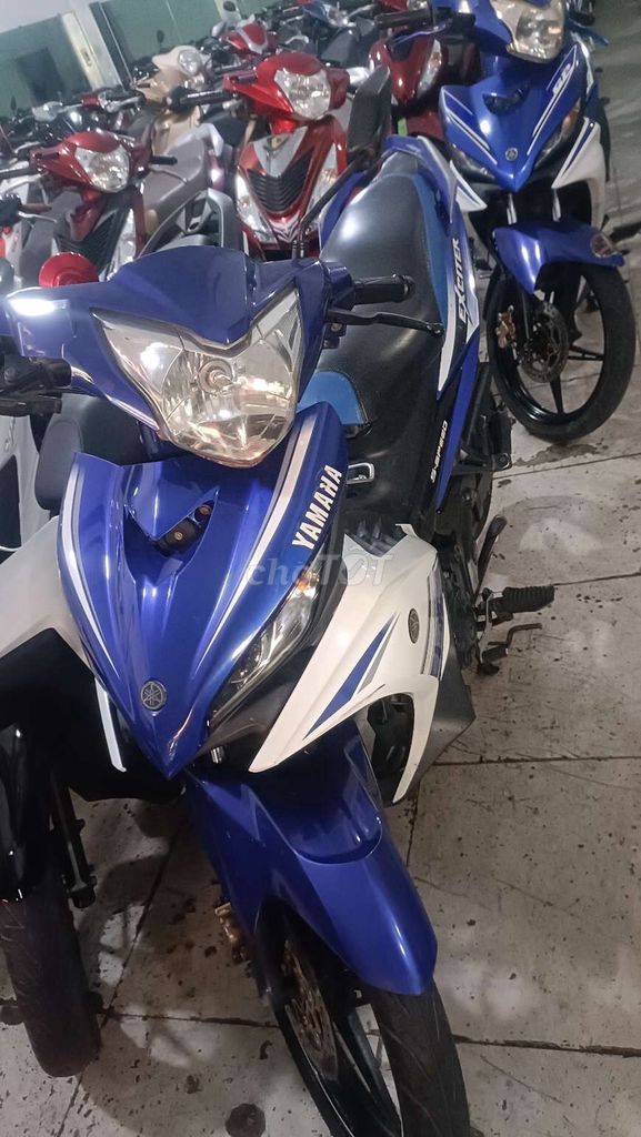 Yamaha Exciter 135 2014 Xanh trắng. Mua bán Xe máy tại Quận Bình Tân Tp Hồ Chí Minh được đăng bởi cửa hàng xe máy cũ Tiến phát chuyên bán góp trả trước 0 đồng hình 1
