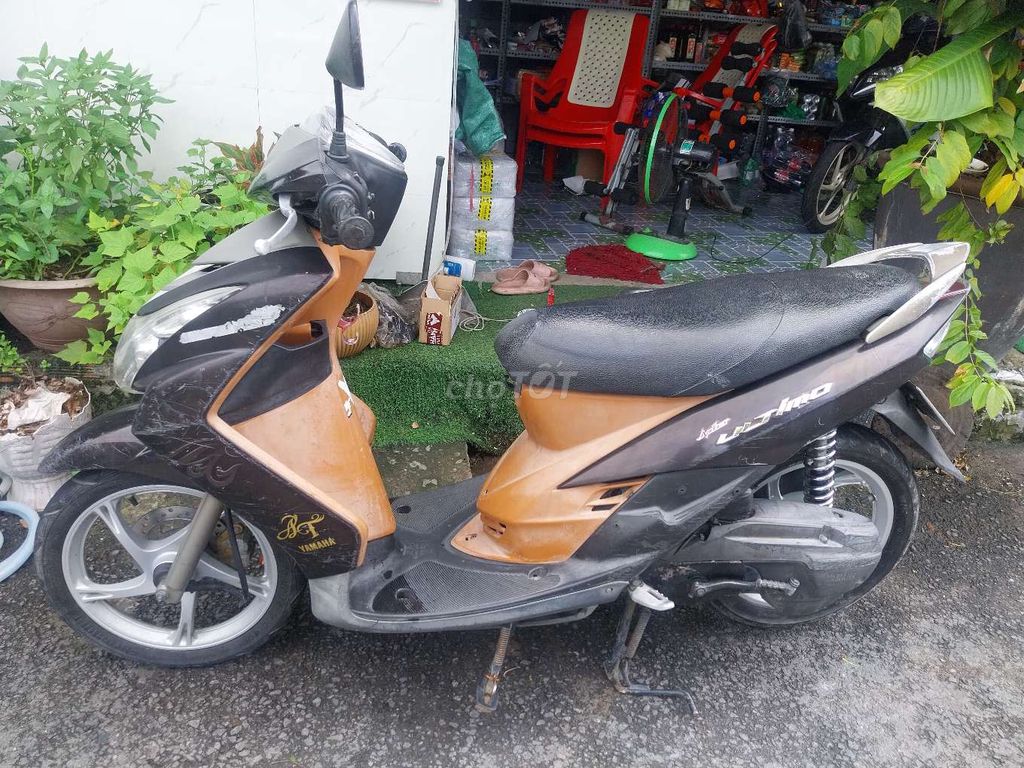 Yamaha Mio Ultimo коричневый, черный Вунг-Тау