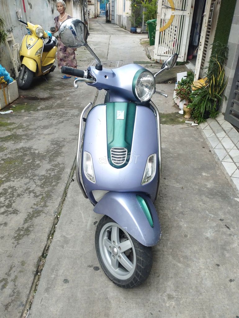 Chính chủ bán Xe VESPA LX125 - 2012 trắng. Mua bán Xe máy tại Quận Tân Bình Tp Hồ Chí Minh được đăng bởi Mr Long hình 4