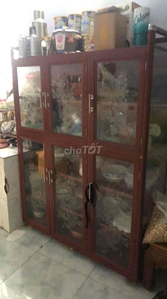 Tủ chén nhôm kính màu Nâu. Mua bán Tủ, kệ gia đình tại Quận Cái Răng Cần Thơ được đăng bởi Ngoc Oanh hình 1