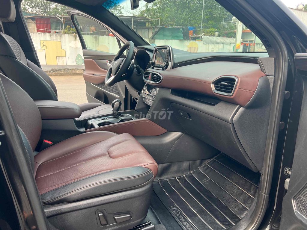 Hyundai Santa Fe Premium 2.2D Đen 82274 km. Mua bán Ô tô tại Quận Cầu Giấy Hà Nội được đăng bởi Cửa hàng Đại Tín Auto hình 9