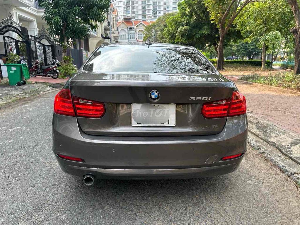 BMW 320i 2014 Nâu/Đen 69000km. Mua bán Ô tô tại Quận 7 Tp Hồ Chí Minh được đăng bởi auto thanh tâm  hình 4