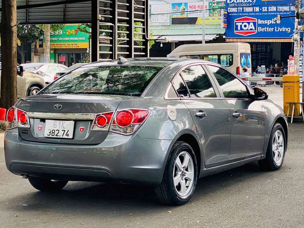 Daewoo Lacetti 1.6AT nhập Hàn. Mua bán Ô tô tại Quận 12 Tp Hồ Chí Minh được đăng bởi TIẾN AUTO  hình 5