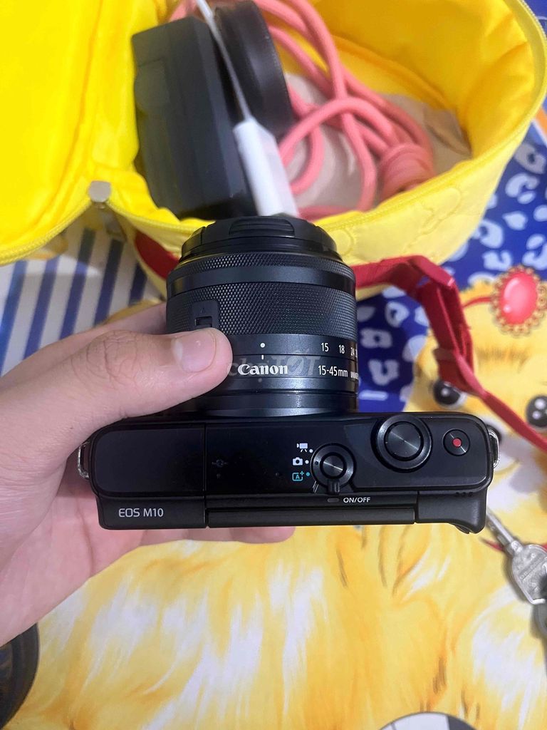 Máy ảnh Canon EOS M10 Hồng. Mua bán Máy ảnh, Máy quay tại Thành phố Thủ Dầu Một Bình Dương được đăng bởi Hồ Quân hình 1