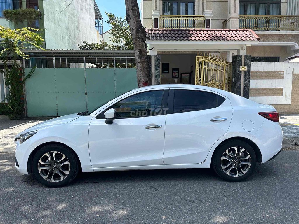 Mazda Mazda 2 2016 Белый 110 тыс. км