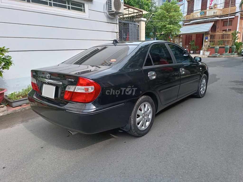 Toyota Camry 3.0V model 2004 màu đen cọp. Mua bán Ô tô tại Quận Gò Vấp Tp Hồ Chí Minh được đăng bởi Việt 8080 hình 9