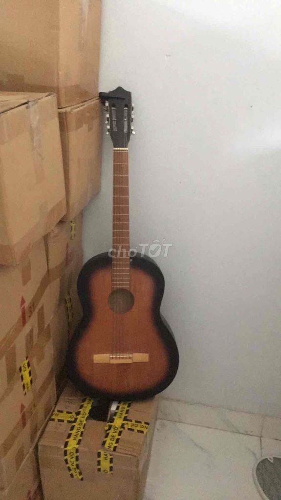 Đàn guitar gỗ nâu đen. Mua bán Nhạc cụ tại Huyện Củ Chi Tp Hồ Chí Minh được đăng bởi A Vũ hình 1