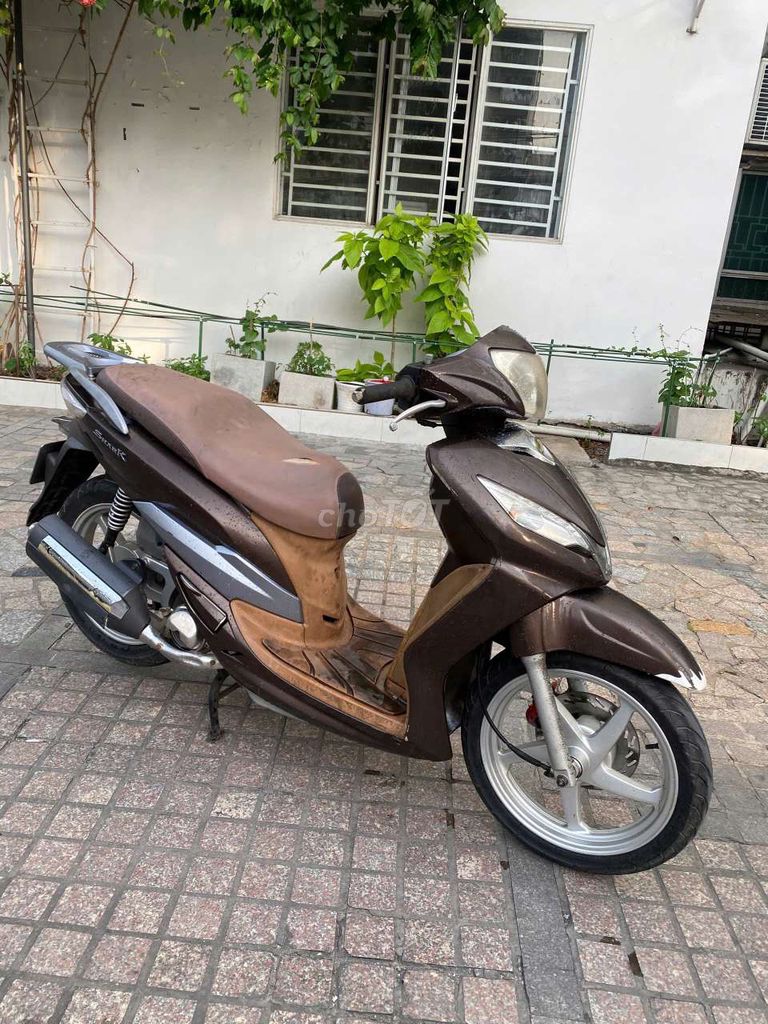 SYM Shark màu Nâu. Mua bán Xe máy tại Quận 7 Tp Hồ Chí Minh được đăng bởi trình minh sơn hình 1