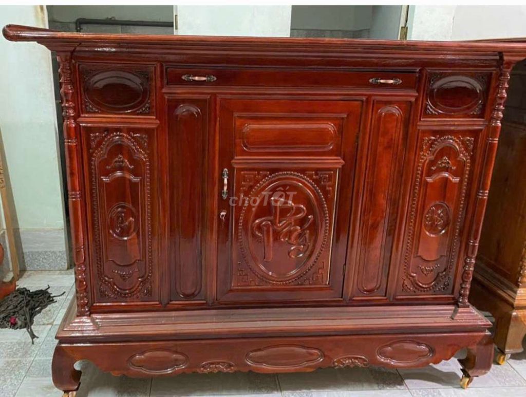 Tủ thờ gỗ tràm nâu đỏ 1m27. Mua bán Tủ, kệ gia đình tại Huyện Thới Lai Cần Thơ được đăng bởi Đồ Gỗ Nội Thất Phước Lộc hình 1