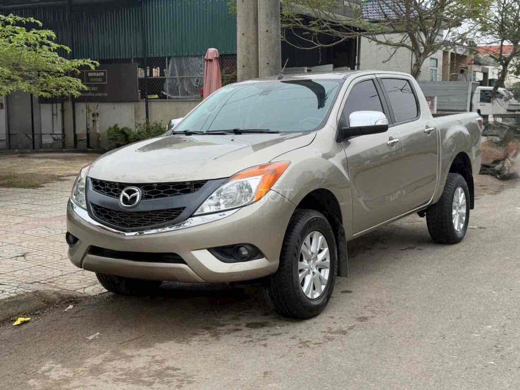 Mazda BT50 2015 Tự động Vàng cát. Mua bán Ô tô tại Quận 12 Tp Hồ Chí Minh được đăng bởi TRƯƠNG CHÍ LÂM hình 8