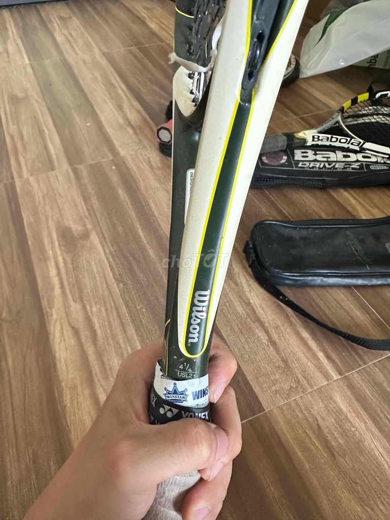 Vợt tennis Wilson xanh rêu, Trắng, Vàng. Mua bán Đồ thể thao, Dã ngoại tại Quận Ngũ Hành Sơn Đà Nẵng được đăng bởi Nzxt Man hình 1