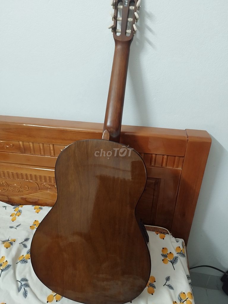 Đàn guitar Yamaha CX40 Nâu. Mua bán Nhạc cụ tại Quận Hà Đông Hà Nội được đăng bởi Xuân Biển hình 1