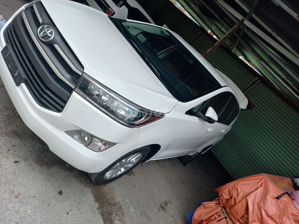 Toyota Innova 2.0E Trắng 172345 km. Mua bán Ô tô tại Quận Bình Tân Tp Hồ Chí Minh được đăng bởi KHANH BINH  hình 5