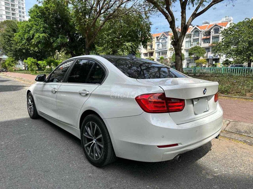 BMW 320i sx 2014 Trắng 72000 km. Mua bán Ô tô tại Quận 7 Tp Hồ Chí Minh được đăng bởi auto thanh tâm  hình 3