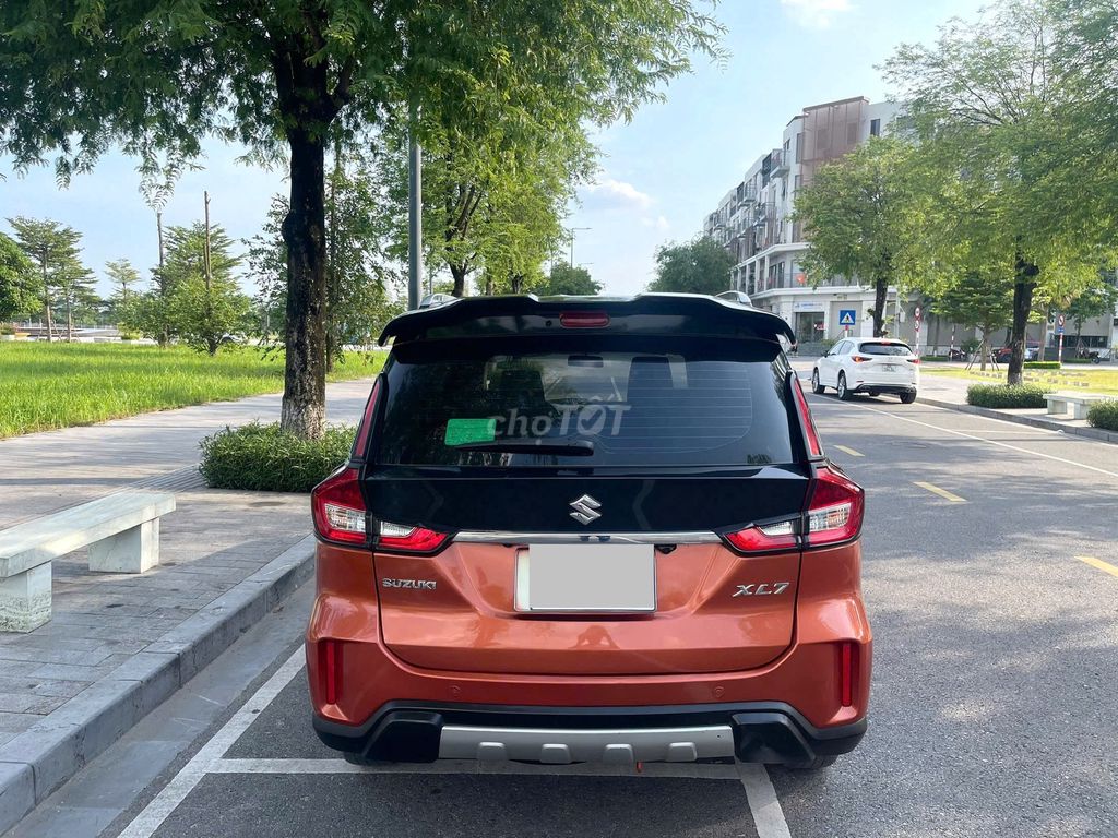 Suzuki XL7 sx 2021 màu cam. Mua bán Ô tô tại Quận Thanh Xuân Hà Nội được đăng bởi Thanh Biz Nguyễn Thái Auto hình 3