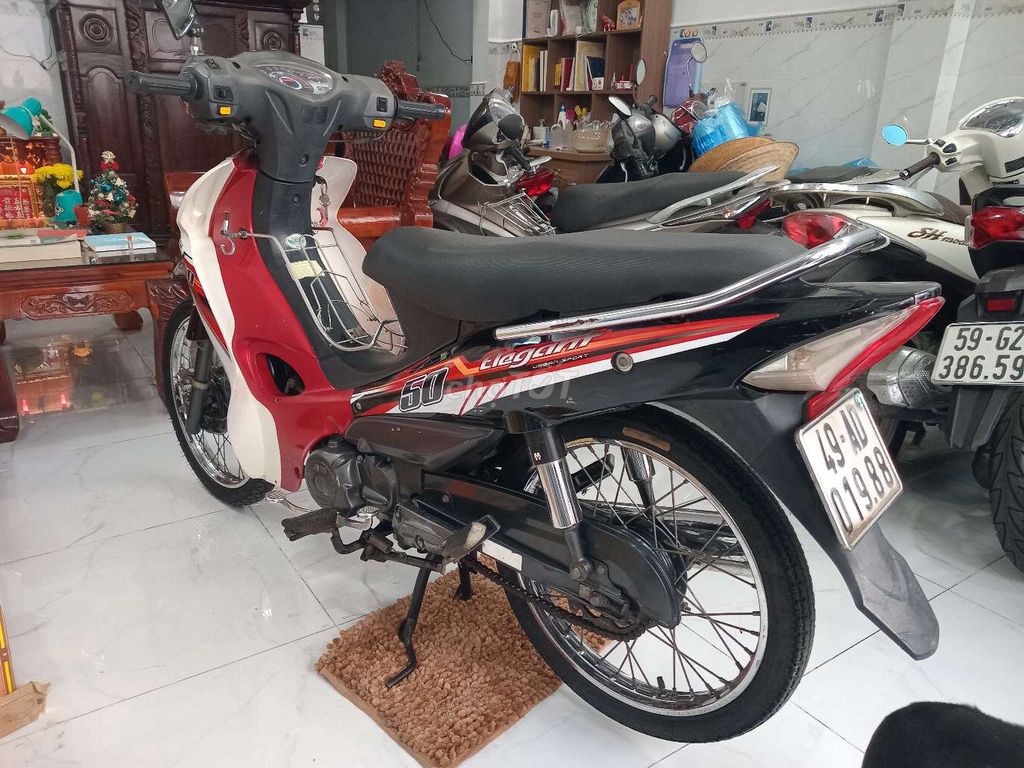 SYM Elegant xe 50 Đỏ Trắng Đen. Mua bán Xe máy tại Quận 7 Tp Hồ Chí Minh được đăng bởi Lê Xuân Thứ hình 4