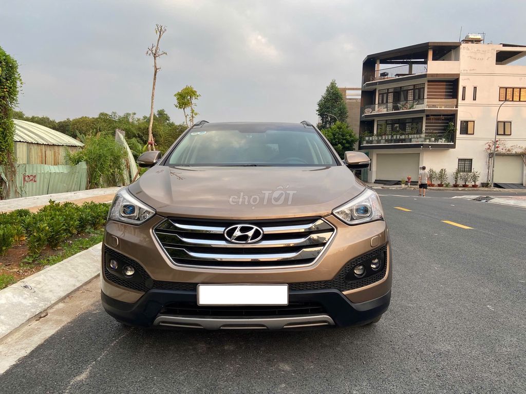 Santa Fe 2.4L 4WD ghi vàng 2014