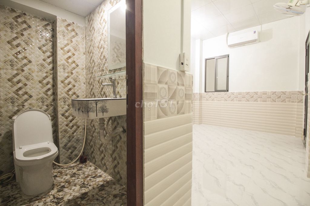 Phòng mới xây đường Văn Cao Quận Tân Phú - Giá 3,3tr/tháng 
