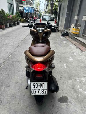 Honda PCX 125 Fi màu vàng đồng đời 2011 bstp