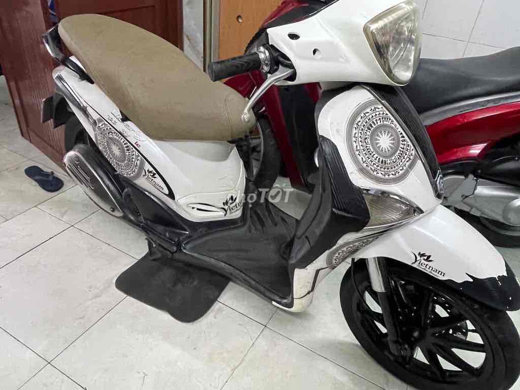 Белый бензин Piaggio Liberty Fi