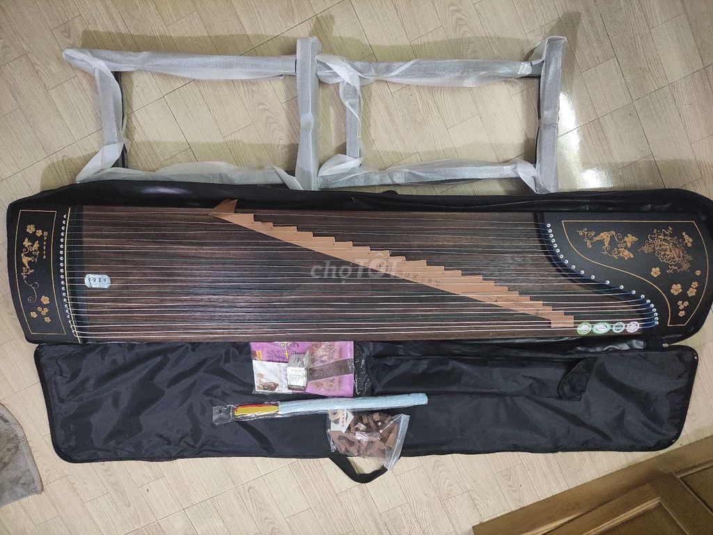 Đàn Guzheng Thiên Đồng Gỗ Nâu Mới 100%. Mua bán Nhạc cụ tại Quận Hoàng Mai Hà Nội được đăng bởi Nguyễn Mạnh Thắng hình 1
