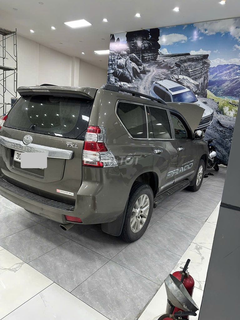 Toyota Land Cruiser Prado 2016 TXL 2.7L 13 vạn Km. Mua bán Ô tô tại Quận Bắc Từ Liêm Hà Nội được đăng bởi Viet Auto hình 2
