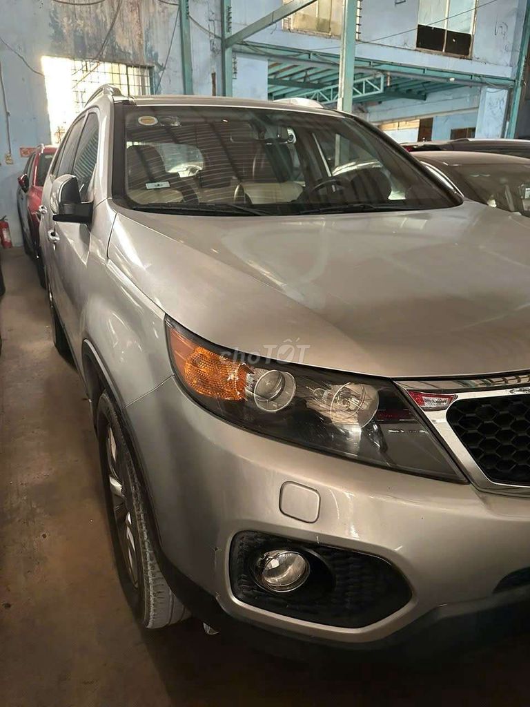 Kia Sorento 2010 2-осный серебристый бензиновый автомат