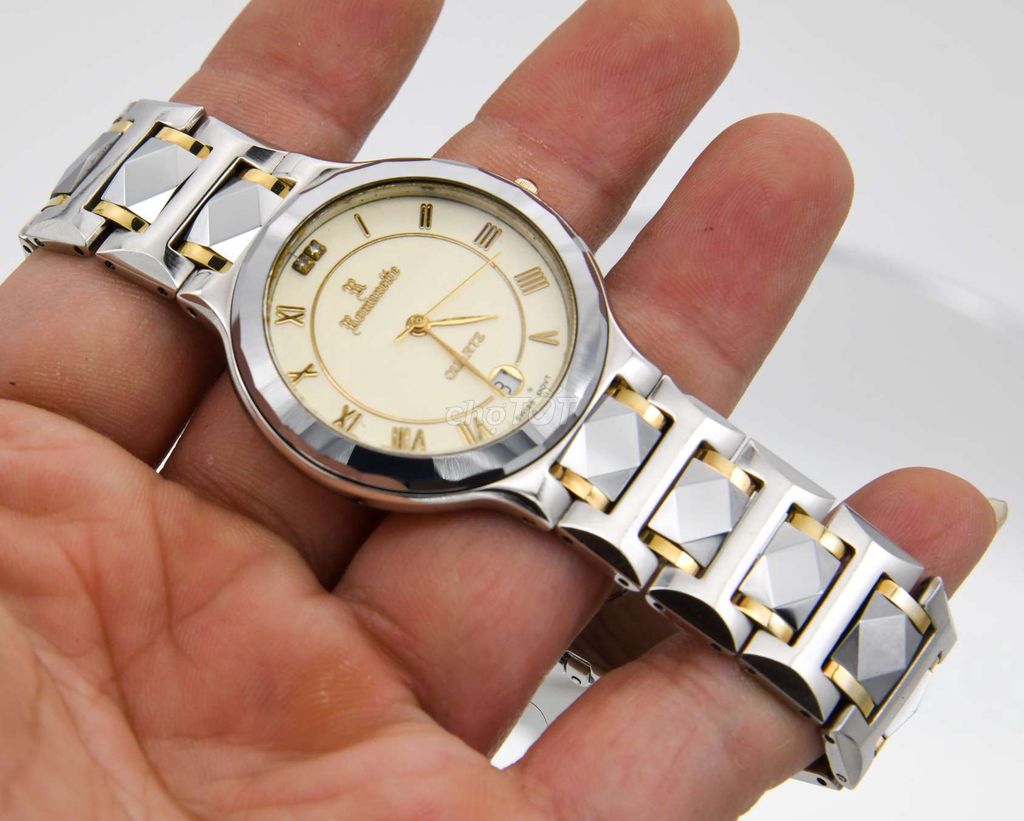 Đồng hồ Romanette vỏ đá núm vàng đúc Thụy Sĩ