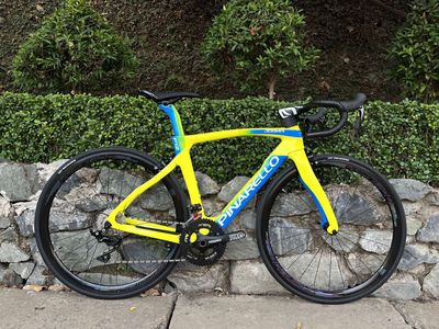 Xe đạp Pinarello F12 vàng xanh
