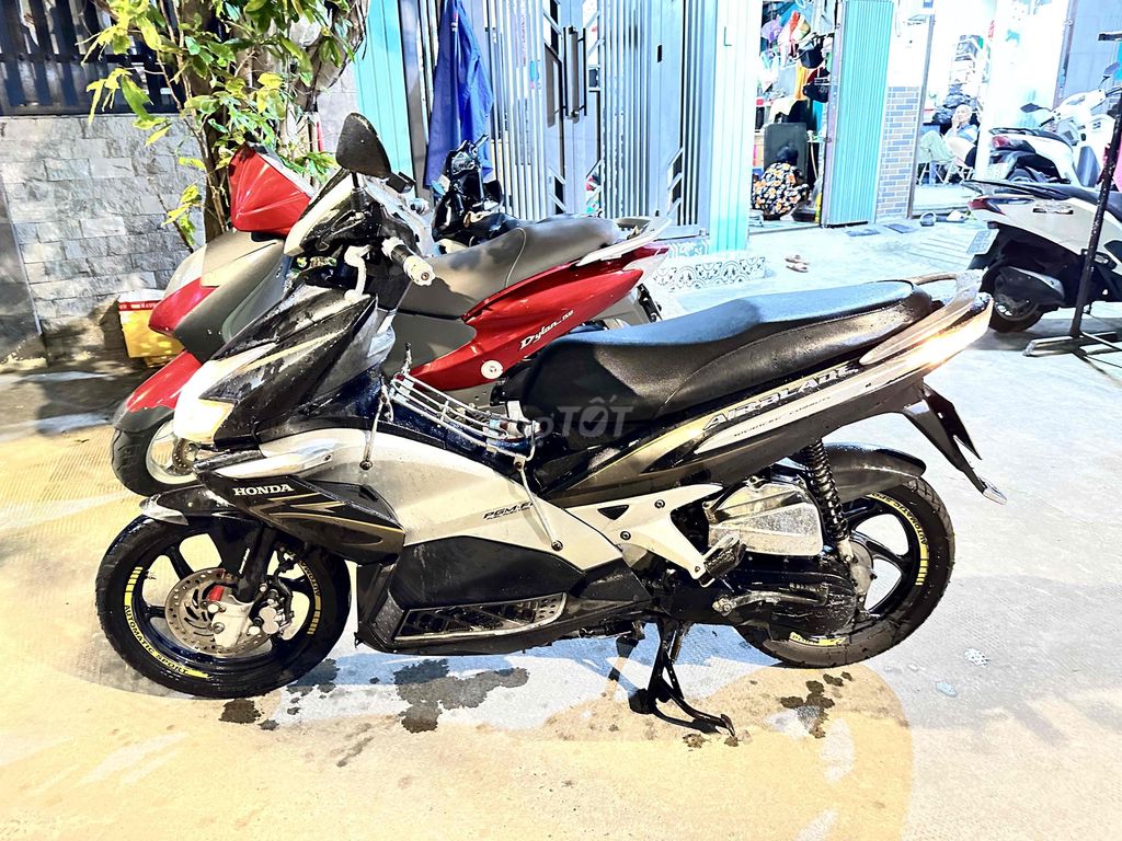 Honda Air Blade черный серебристый инжектор