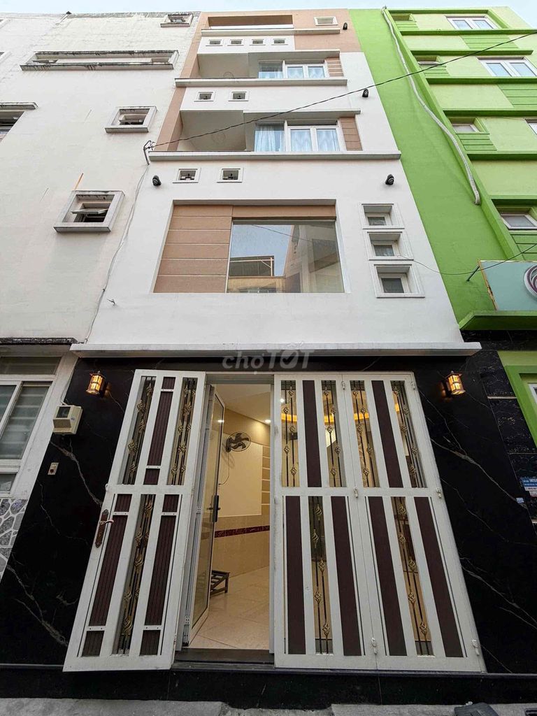 Cho thuê nhà nguyên căn 5 Tầng Hẻm xe hơi 29/23 Đoàn Thị Điểm , Quận P