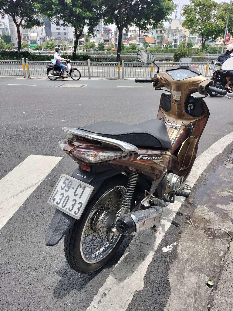 Bán xe future 125 màu vàng đen chính chủ. Mua bán Xe máy tại Quận 4 Tp Hồ Chí Minh được đăng bởi Vo van dung hình 1