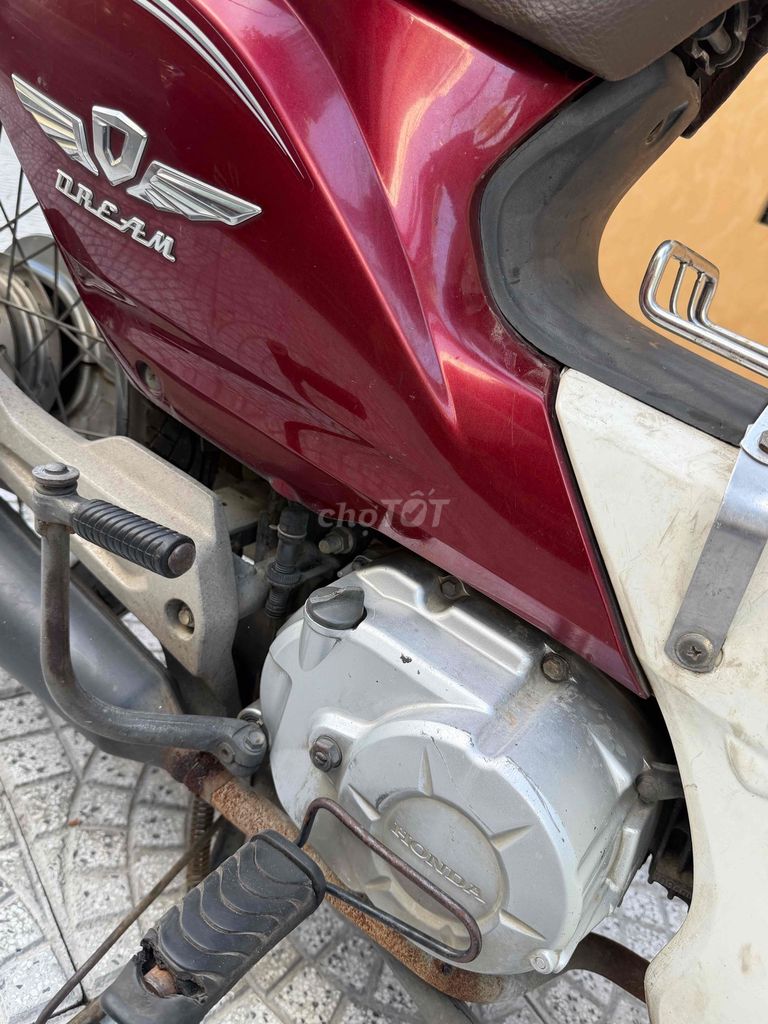 Красная Honda Super Dream, полуавтомат