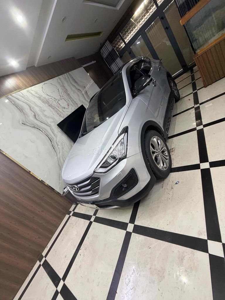 Hyundai SantaFe 2014 серебристый автомат 107000 км