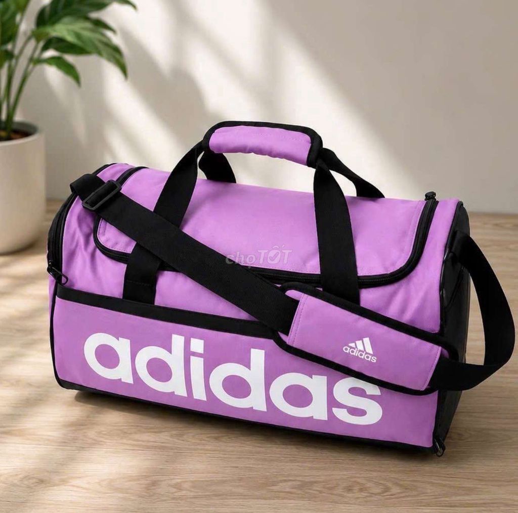 Túi trống Adidas Tím 20 x 45 x 23. Mua bán Túi xách tại Quận Gò Vấp Tp Hồ Chí Minh được đăng bởi Anh Ba  Hàng hiệu tuyển Chuyên bán Online uy tín hình 1