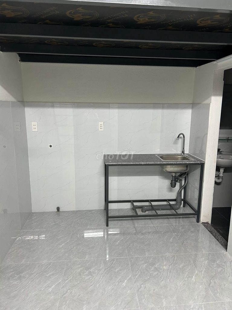 New room with mezzanine and private bath on Lê Như Hổ — photo 3