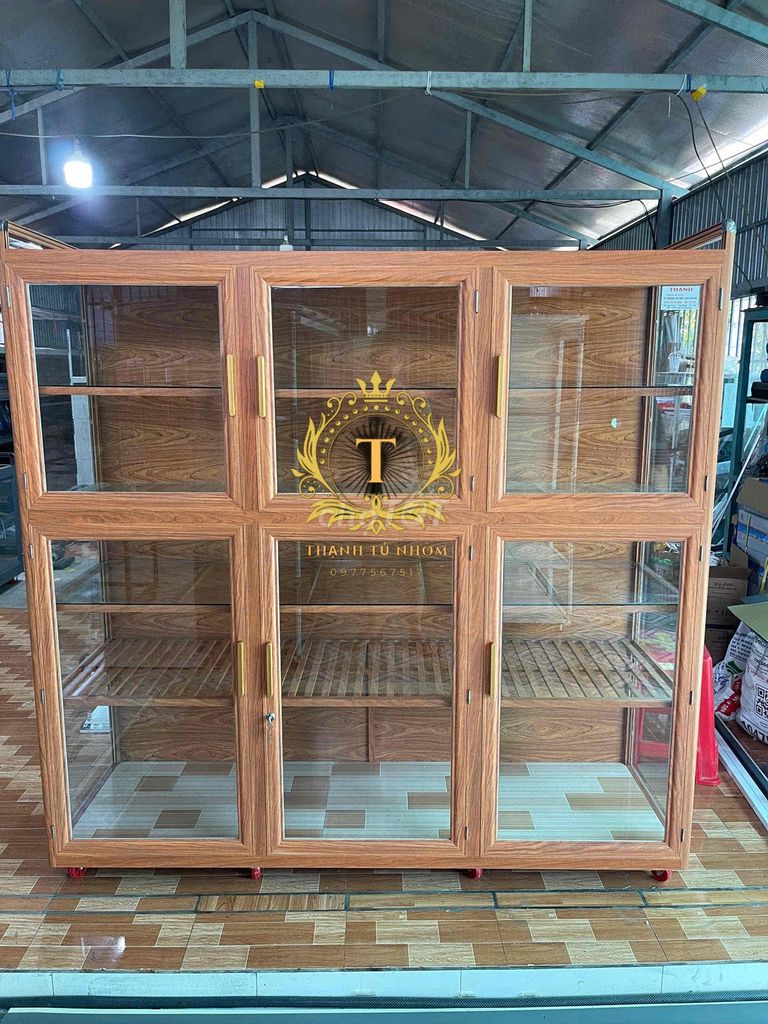 Tủ chén Thanh Tu Nhôm Nhôm giả gỗ. Mua bán Tủ, kệ gia đình tại Huyện Chợ Mới An Giang được đăng bởi Đặng Hiếu Thạnh hình 1