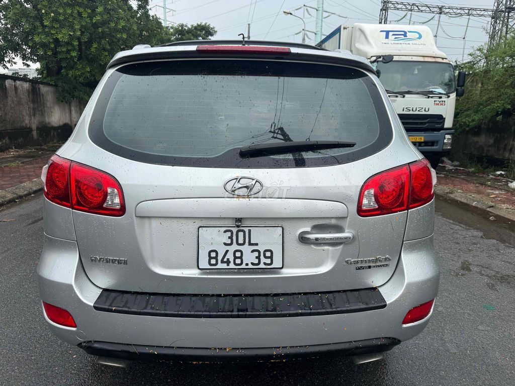 Hyundai SantaFe 2008 серебристый 7 мест автомат бензин