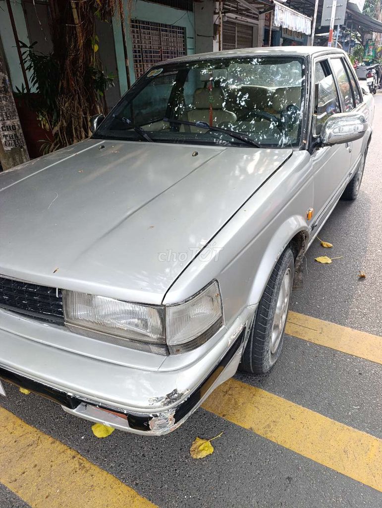 Nissan Bạc Số sàn. Mua bán Ô tô tại Huyện Long Hồ Vĩnh Long được đăng bởi Nguyễn Thái  hình 3