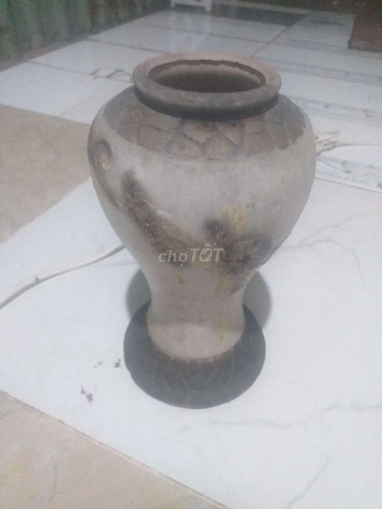 để cái bình sứ trắng như hình. 150k